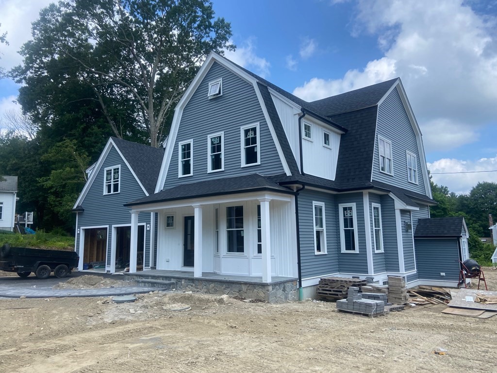 70 Birchwood Road Holliston, MA 01746 - Photo 1 of 7 a front view of a house with yard