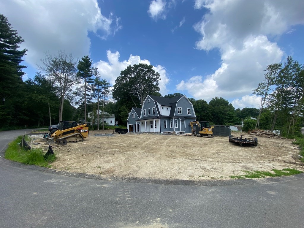 70 Birchwood Road Holliston, MA 01746 - Photo 7 of 7 a view of a house with swimming pool and sitting area