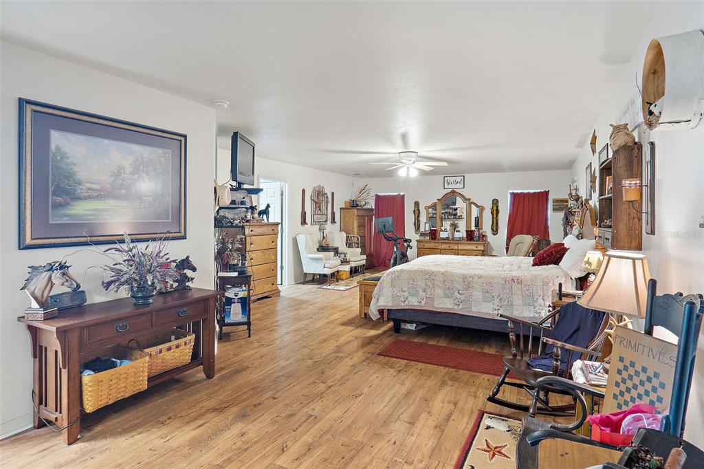 19355 Southwest 25th Place Dunnellon, FL 34431 - Photo 23 of 38 a living room with furniture and wooden floor