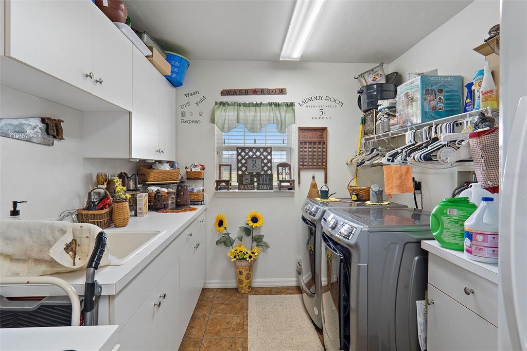 19355 Southwest 25th Place Dunnellon, FL 34431 - Photo 30 of 38 a view of a kitchen and utility room