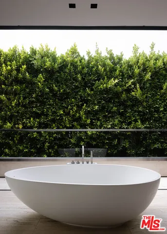 a view of a bathtub in a residential houses