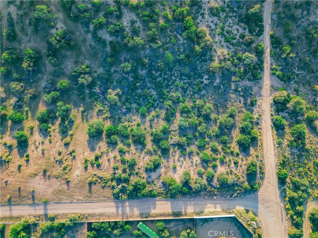 0 Alta Mesa Road Oak Hills, CA 92344 - Photo 8 of 10 an aerial view of residential houses with outdoor space and trees
