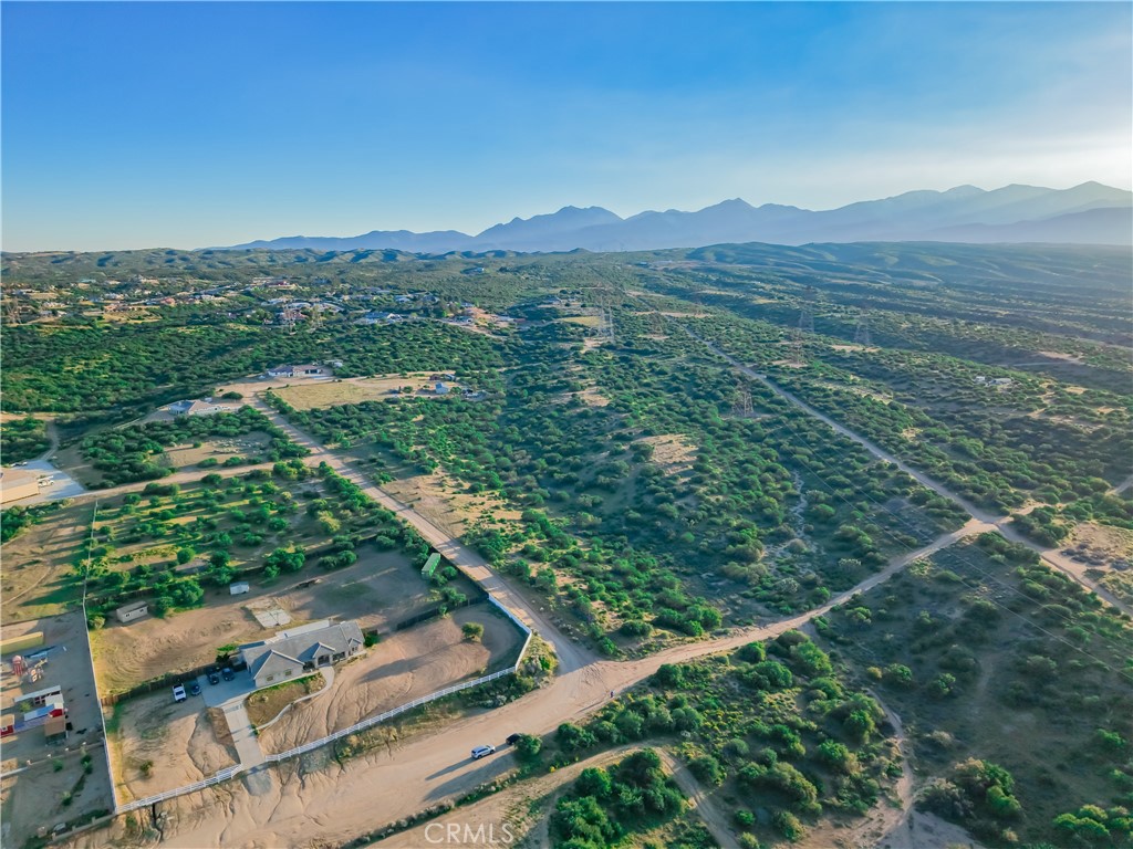 0 Alta Mesa Road Oak Hills, CA 92344 - Photo 9 of 10 a view of a city with lush green forest