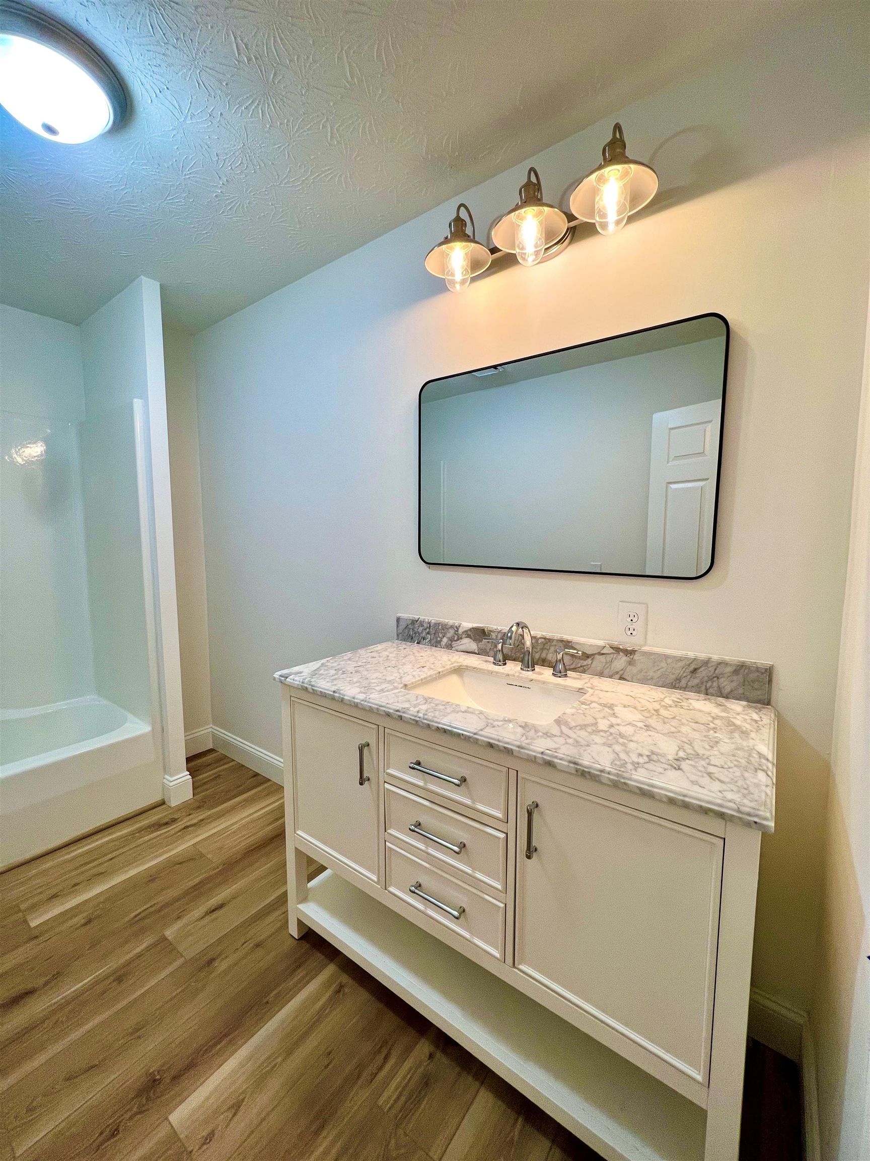 10293 Cook Town Road Bridgewater, VA 22812 - Photo 13 of 22 a bathroom with a sink and a mirror