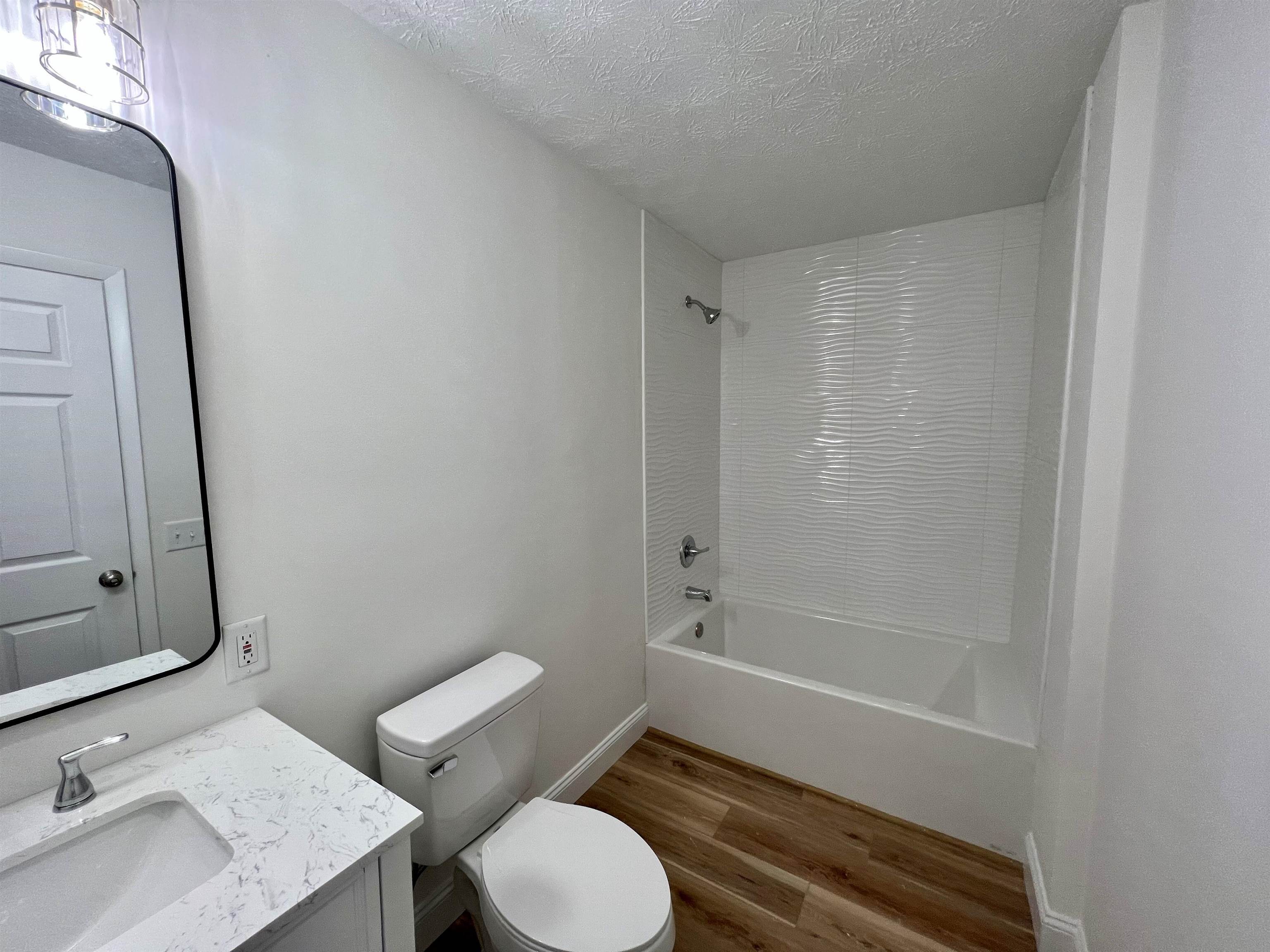 10293 Cook Town Road Bridgewater, VA 22812 - Photo 17 of 22 a bathroom with a sink toilet and shower