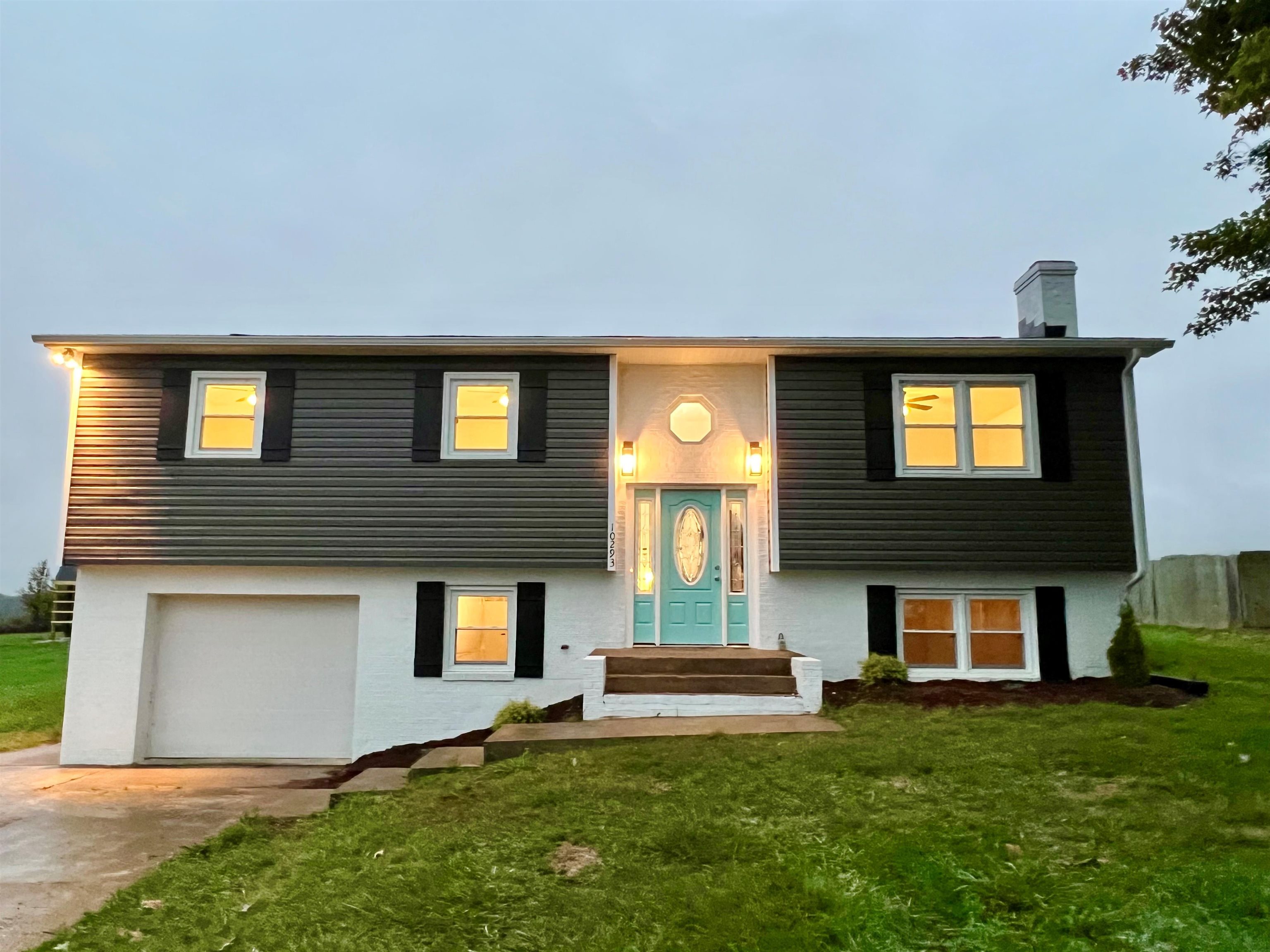 10293 Cook Town Road Bridgewater, VA 22812 - Photo 22 of 22 a front view of a house with a yard and garage