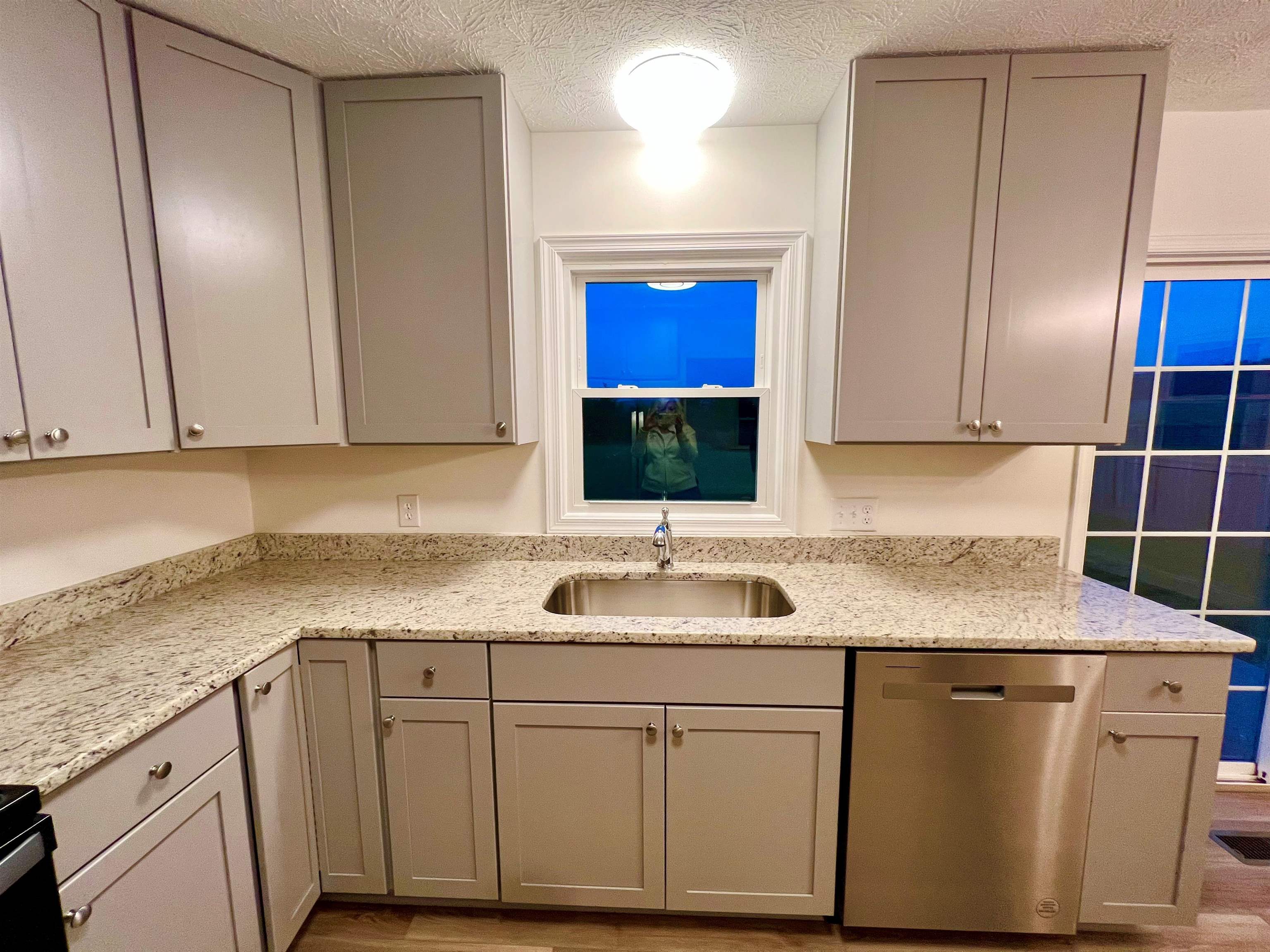10293 Cook Town Road Bridgewater, VA 22812 - Photo 6 of 22 a kitchen with stainless steel appliances granite countertop a sink and cabinets