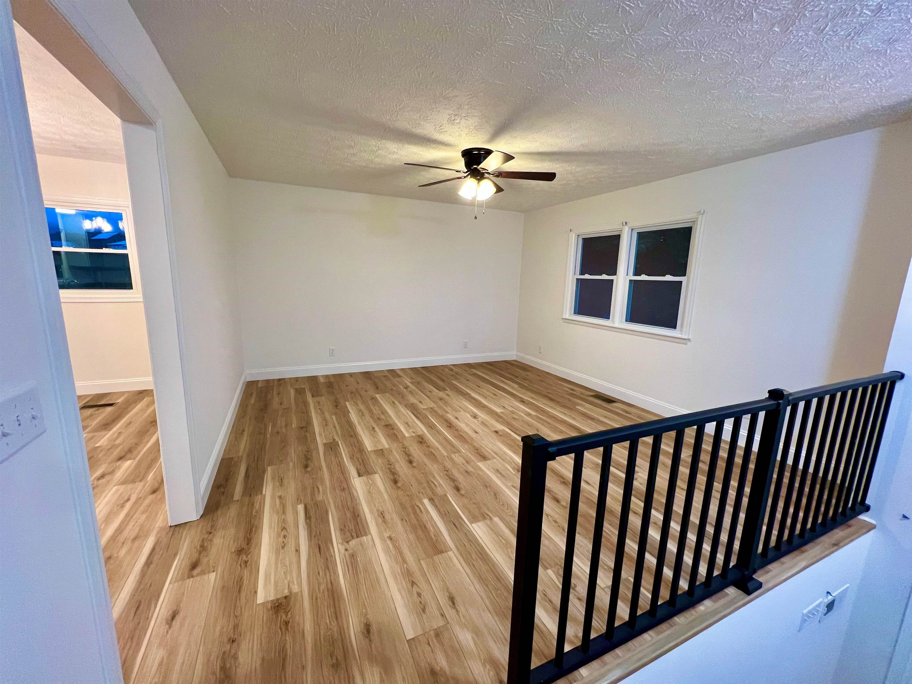 10293 Cook Town Road Bridgewater, VA 22812 - Photo 9 of 22 wooden floor in an empty room with a window