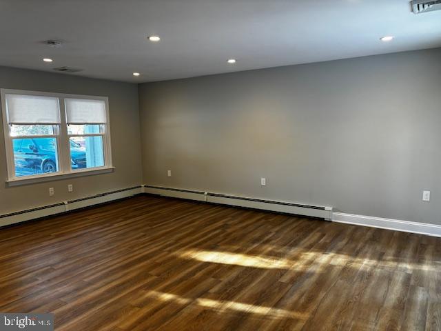 137 Carter Road Princeton, NJ 08540 - Photo 14 of 19 an empty room with wooden floor and windows