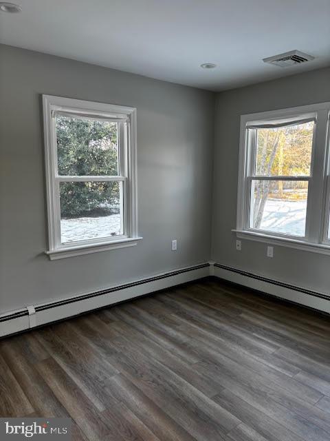 137 Carter Road Princeton, NJ 08540 - Photo 17 of 19 a view of an empty room with wooden floor and a window