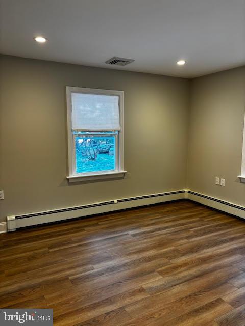 137 Carter Road Princeton, NJ 08540 - Photo 18 of 19 an empty room with wooden floor and windows