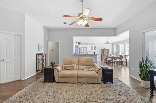 a living room with furniture and a rug