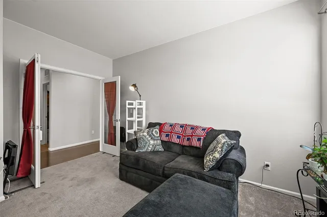 a living room with furniture and a couch