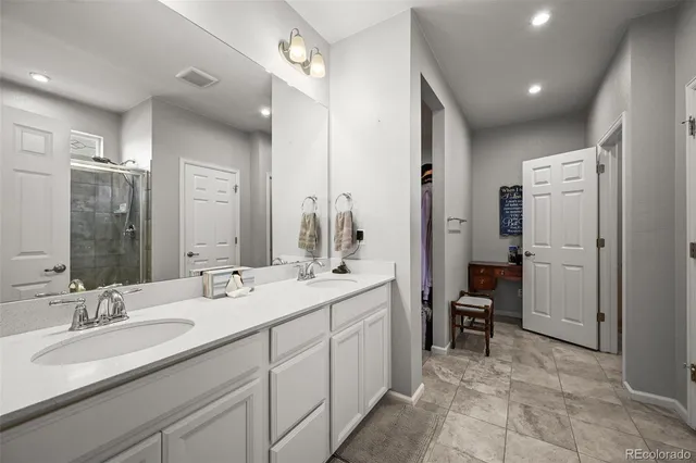 a bathroom with a sink double vanity