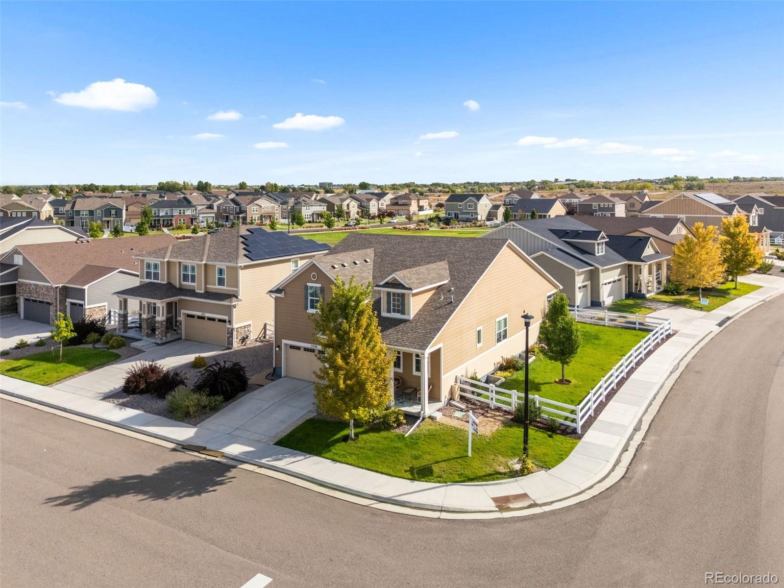 5230 Periwinkle Way Brighton, CO 80640 - Photo 2 of 44 a view of a city from a terrace
