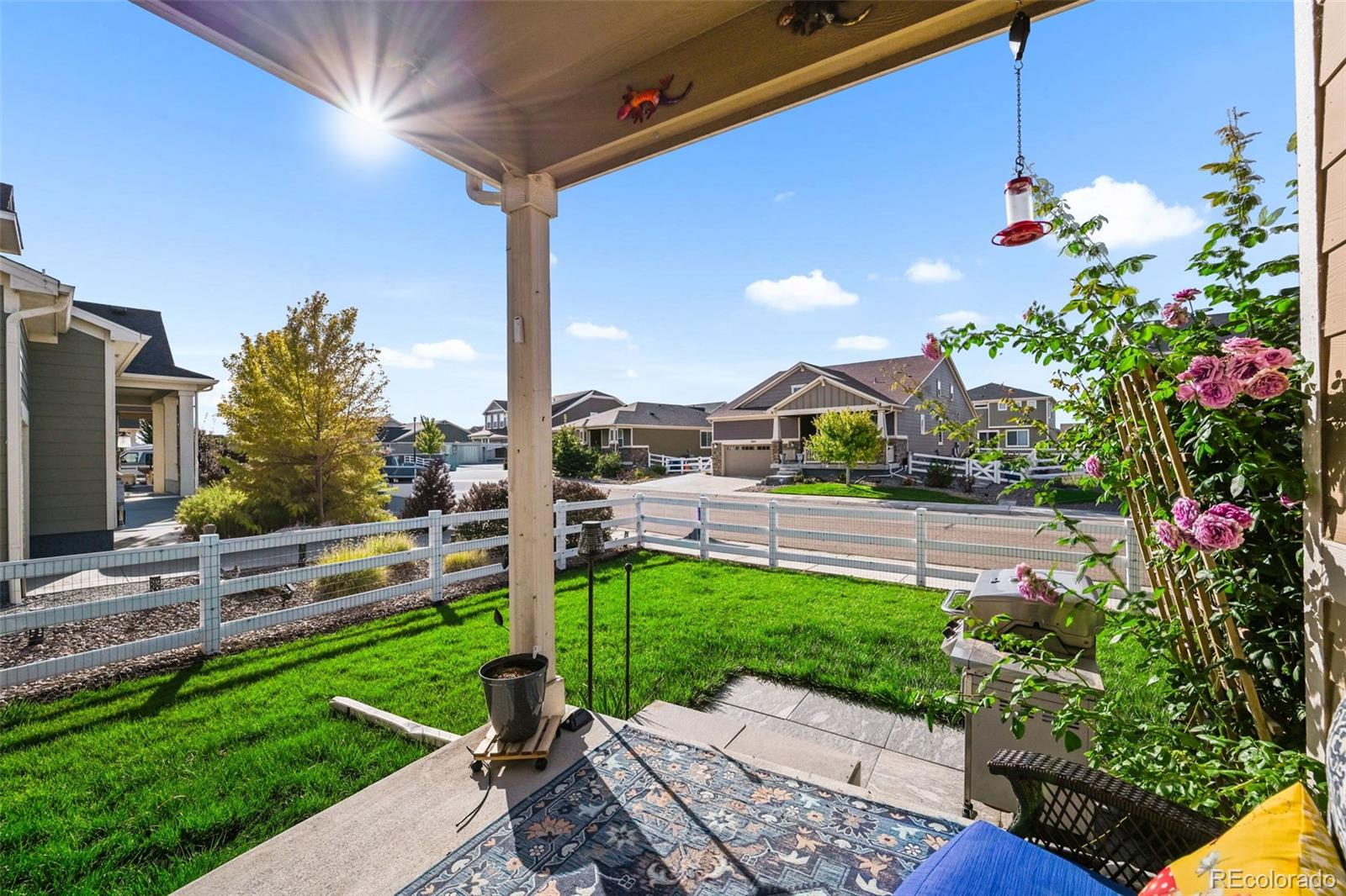 5230 Periwinkle Way Brighton, CO 80640 - Photo 29 of 44 a garden view with a seating space