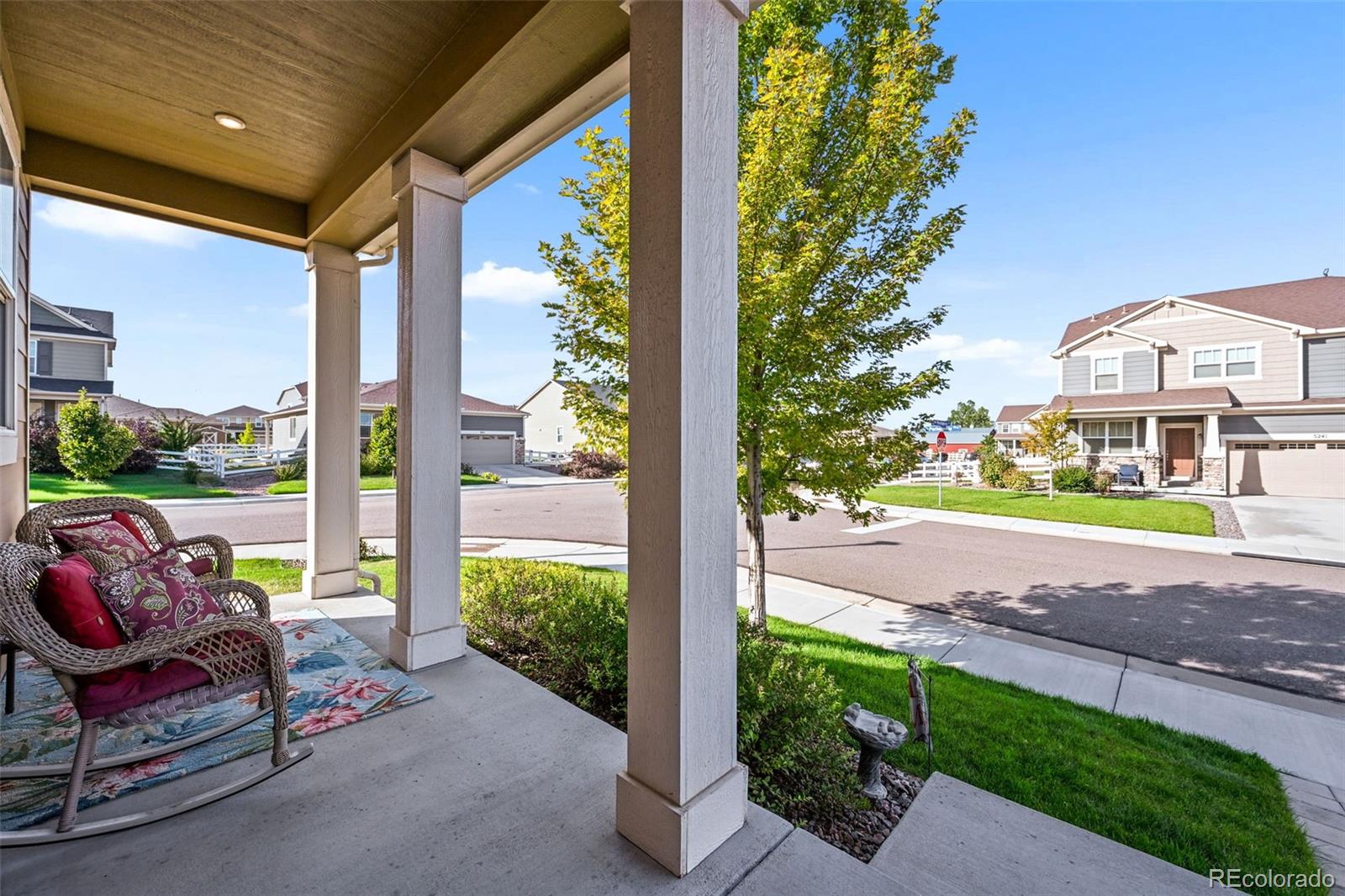 5230 Periwinkle Way Brighton, CO 80640 - Photo 3 of 44 a view of a porch with furniture and garden
