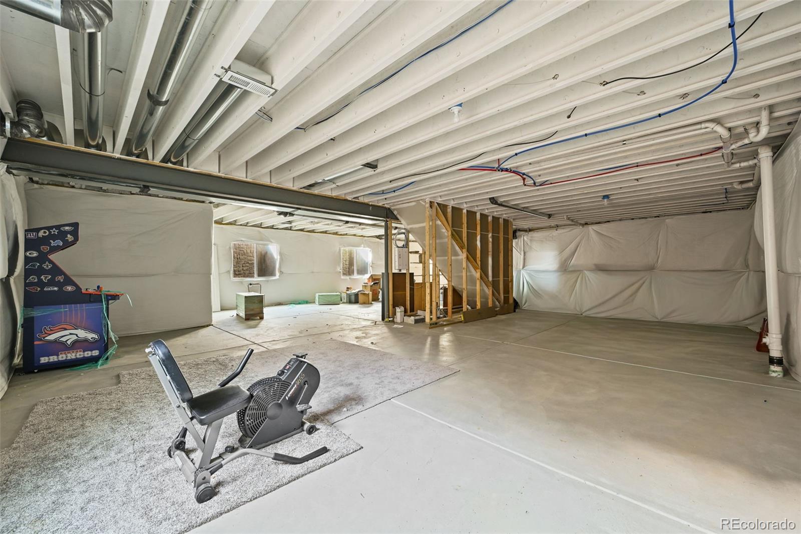 5230 Periwinkle Way Brighton, CO 80640 - Photo 33 of 44 a room with gym equipment