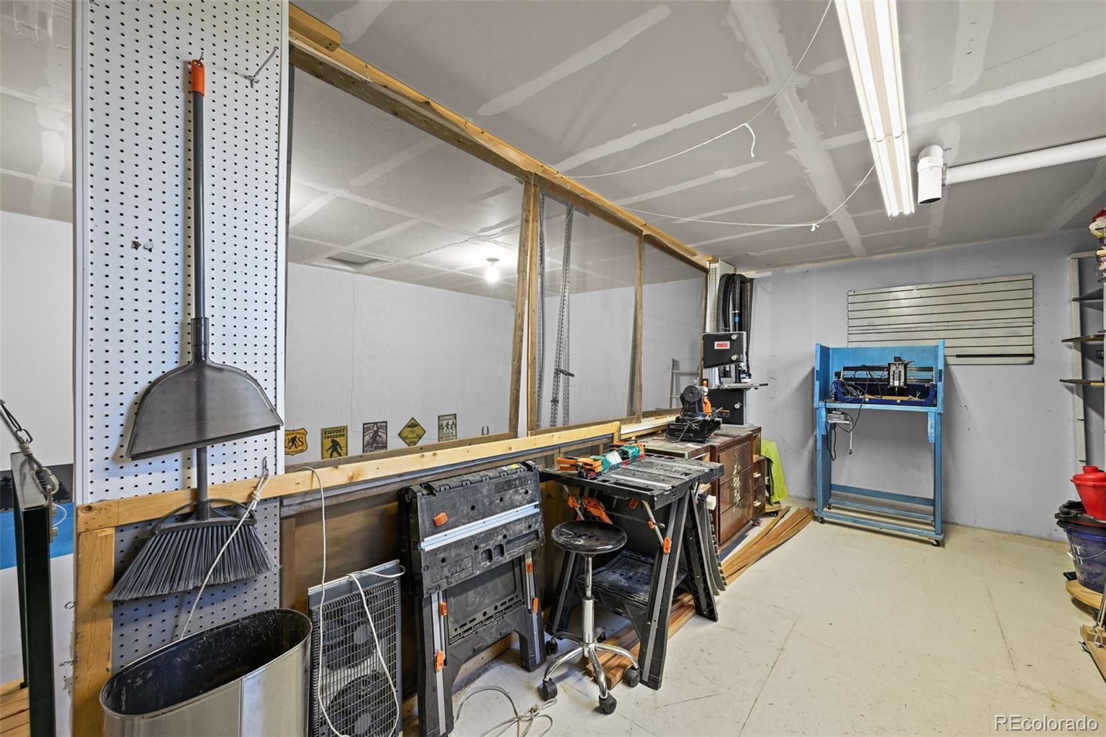 5230 Periwinkle Way Brighton, CO 80640 - Photo 34 of 44 a kitchen with stainless steel appliances granite countertop a stove and a refrigerator