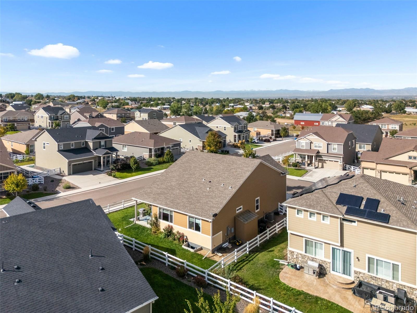 5230 Periwinkle Way Brighton, CO 80640 - Photo 40 of 44 an aerial view of a house with a garden