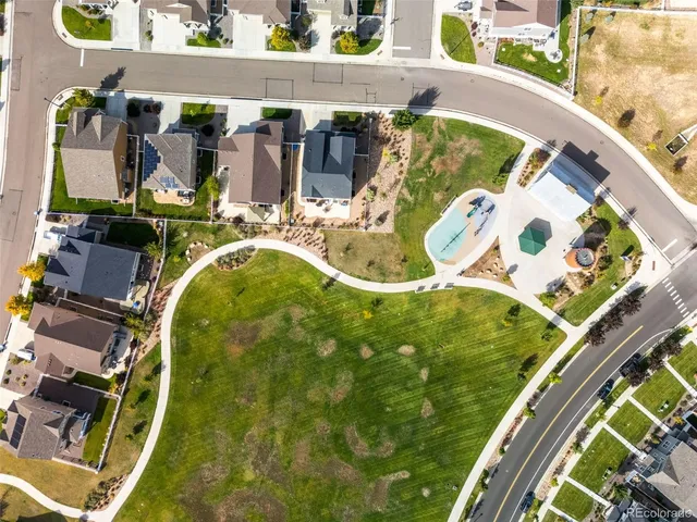 a view of swimming pool from a balcony