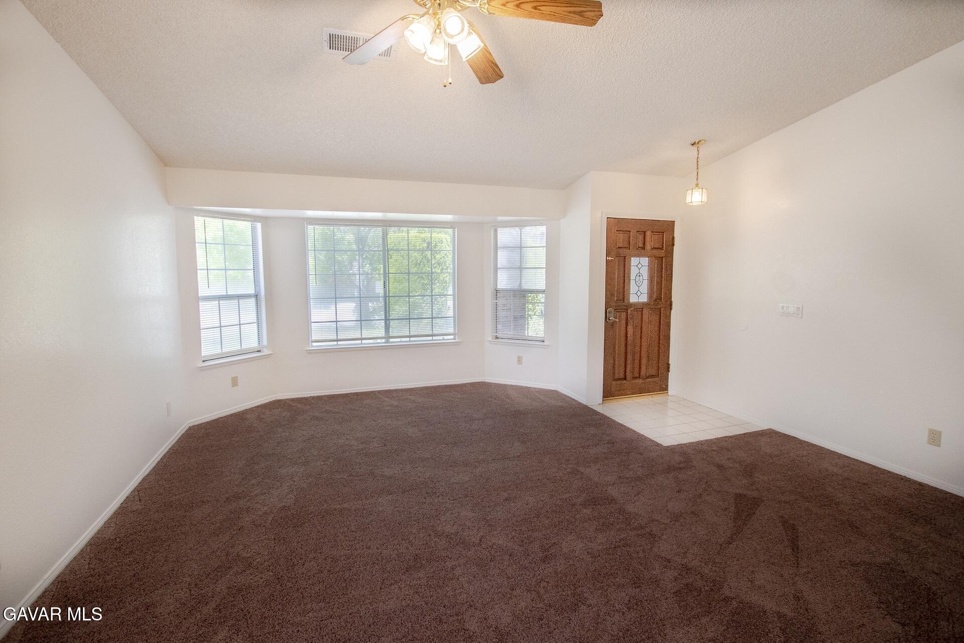 44318 33rd Street West Lancaster, CA 93536 - Photo 14 of 29 a view of an empty room with a window