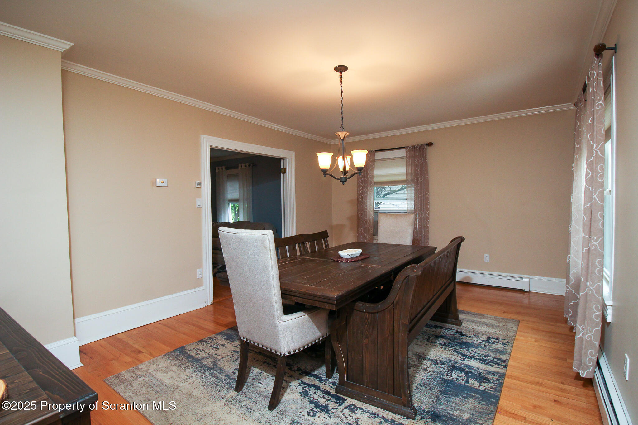 525 North Abington Road Clarks Summit, PA 18411 - Photo 12 of 61 a view of a dining room with furniture and wooden floor