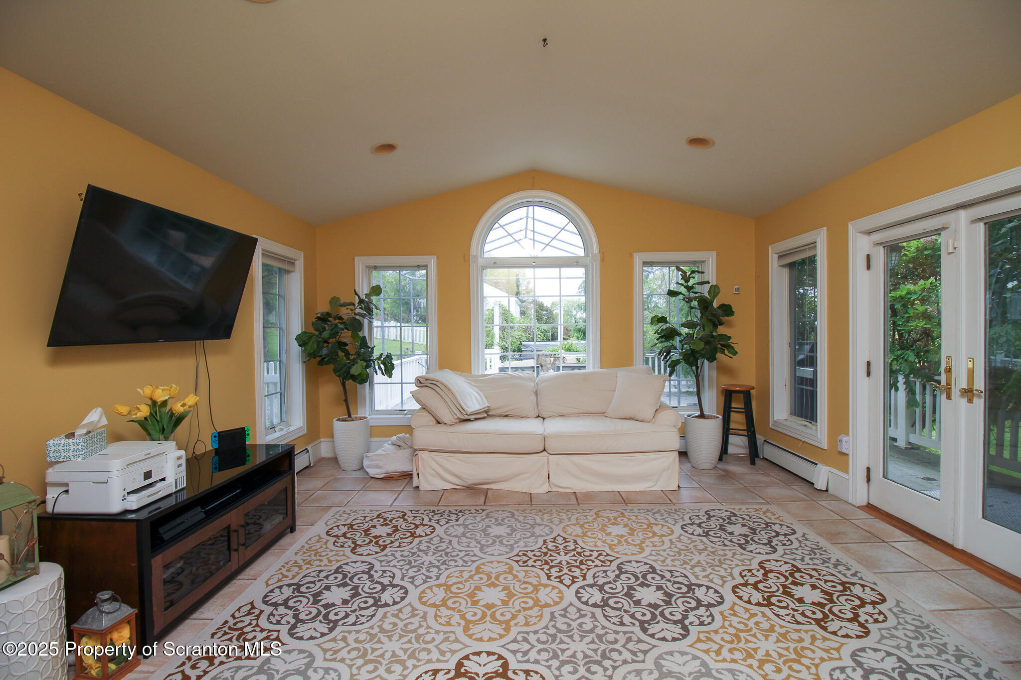 525 North Abington Road Clarks Summit, PA 18411 - Photo 20 of 61 a living room with furniture and a flat screen tv