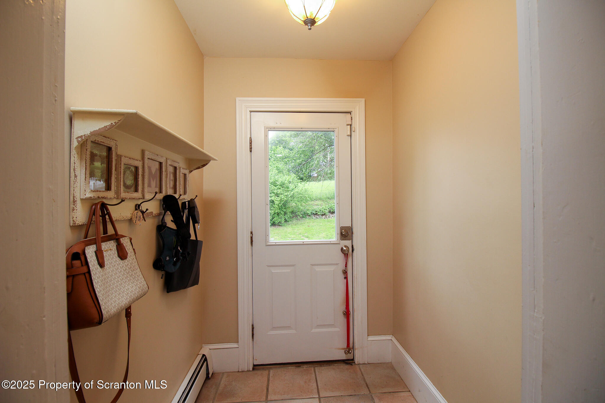 525 North Abington Road Clarks Summit, PA 18411 - Photo 22 of 61 a view of a livingroom with furniture and a window