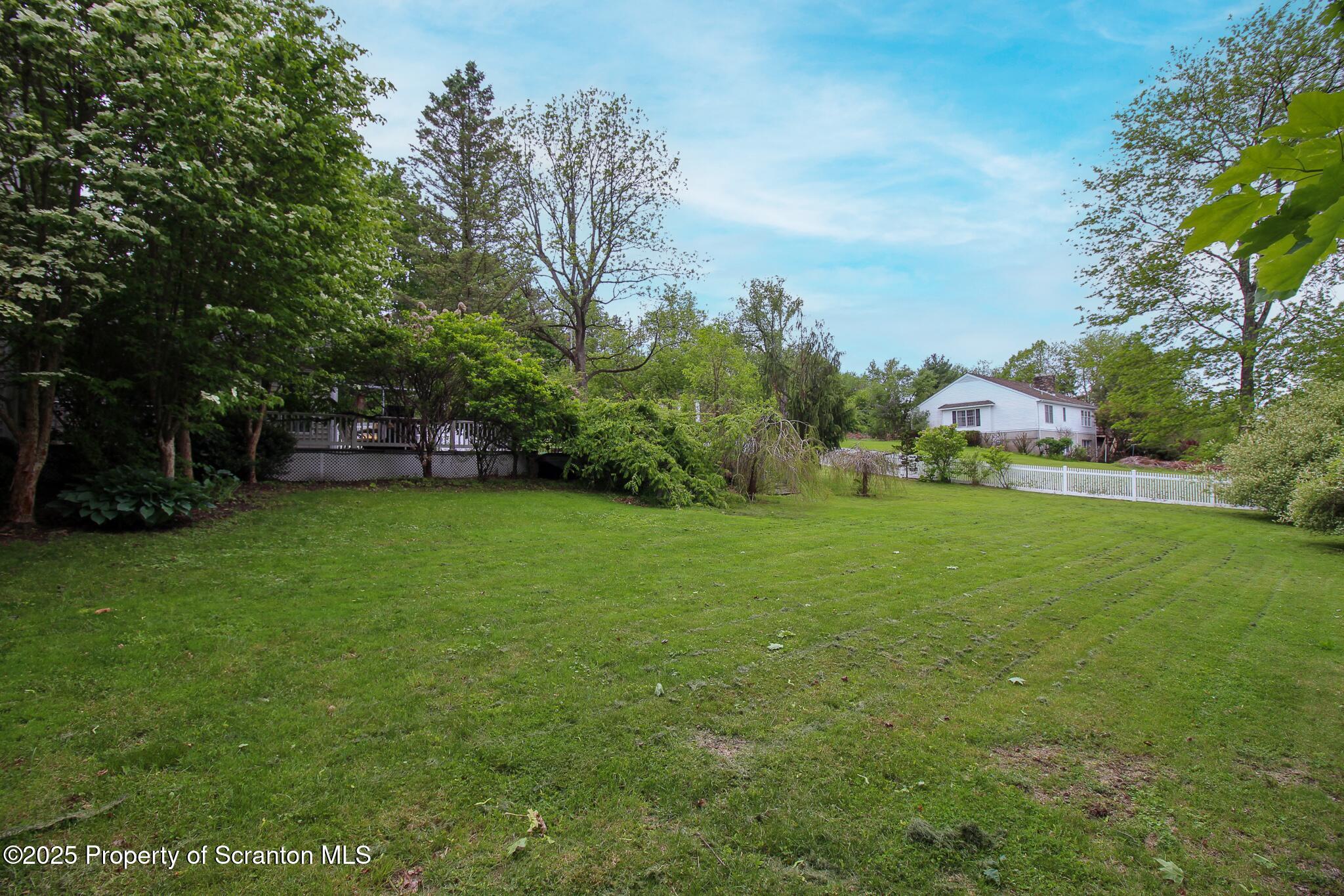 525 North Abington Road Clarks Summit, PA 18411 - Photo 49 of 61 a view of a field of grass and trees