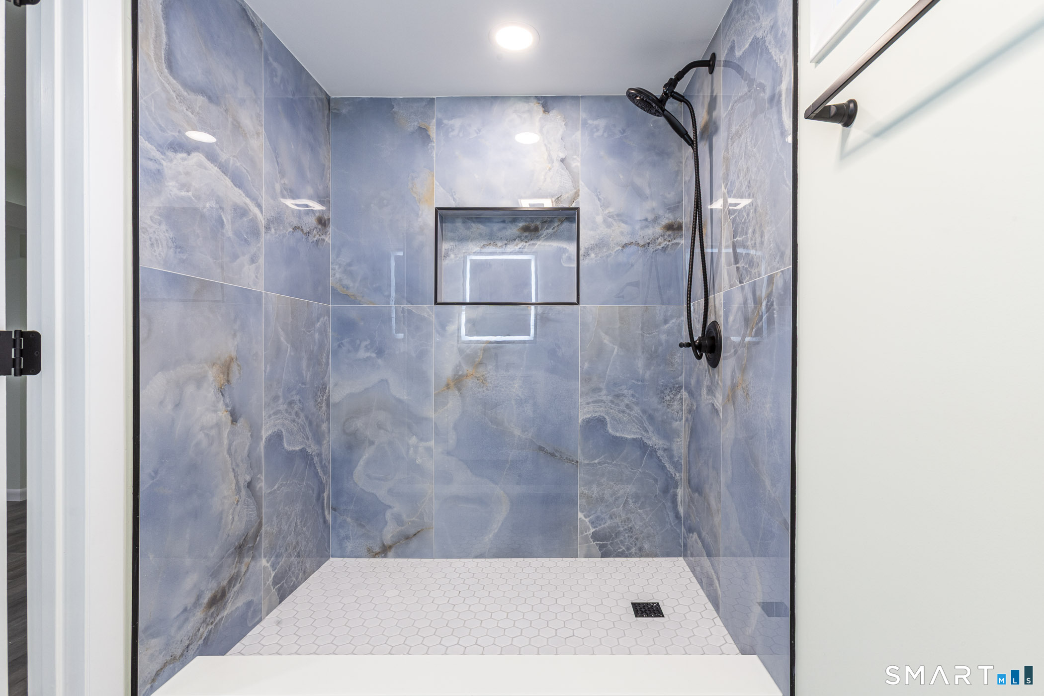 26 Kelly Road Hamden, CT 06518 - Photo 23 of 37 a bathroom with a shower