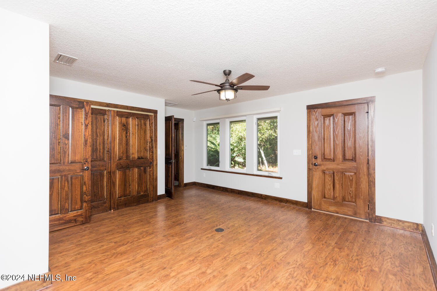 104 Loyola Road St. Augustine, FL 32086 - Photo 18 of 27 a view of an empty room with a window