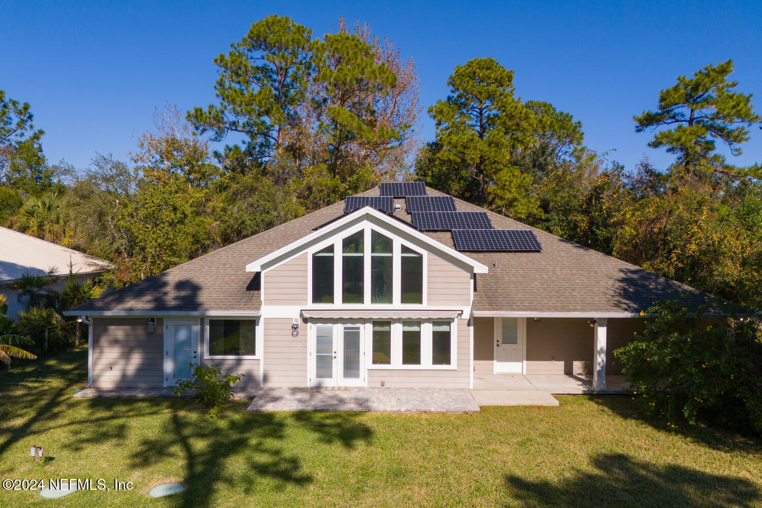 104 Loyola Road St. Augustine, FL 32086 - Photo 27 of 27 a front view of a house with a garden