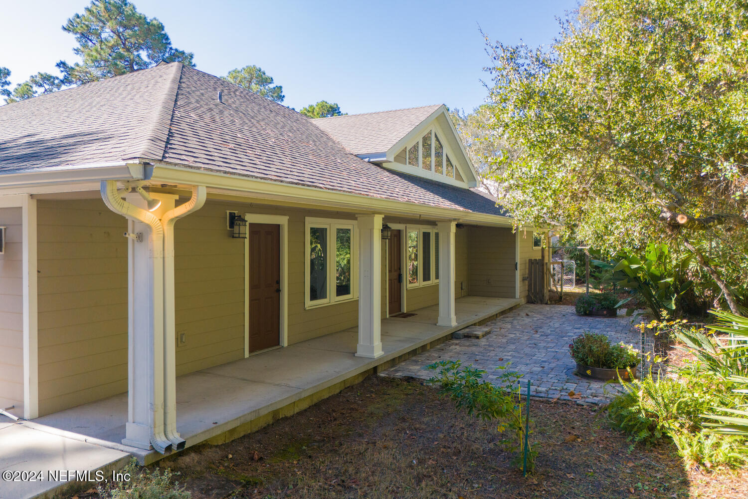 104 Loyola Road St. Augustine, FL 32086 - Photo 3 of 27 a view of a house with backyard
