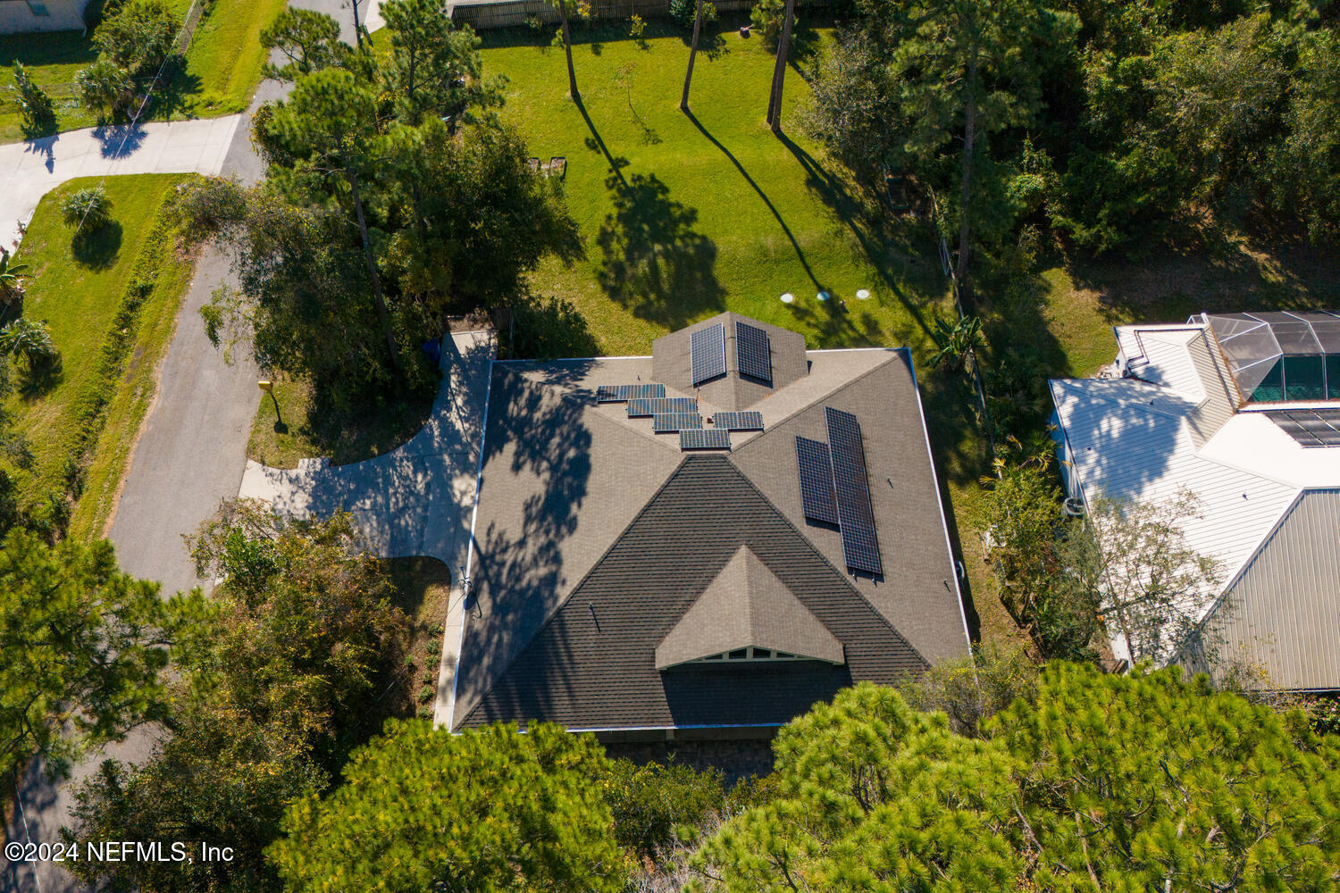 104 Loyola Road St. Augustine, FL 32086 - Photo 9 of 27 an aerial view of a house with a yard