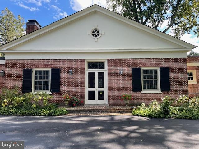 Custom cedar Shutters by Woodwright-Tom Browne
