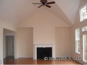 693 Rambling Creek Road Tryon, NC 28782 - Photo 2 of 12 a view of an empty room with a window