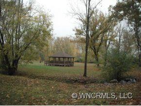 693 Rambling Creek Road Tryon, NC 28782 - Photo 11 of 12 a view of a park that has large trees