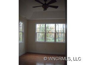 693 Rambling Creek Road Tryon, NC 28782 - Photo 8 of 12 a view of an empty room with a window