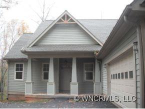 693 Rambling Creek Road Tryon, NC 28782 - Photo 10 of 12 a view of a house