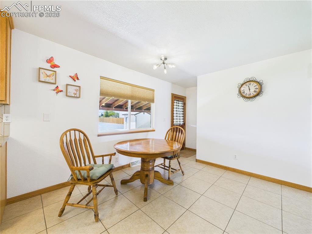 32006 Ford Road Pueblo, CO 81006 - Photo 16 of 50 a view of a livingroom with furniture and window