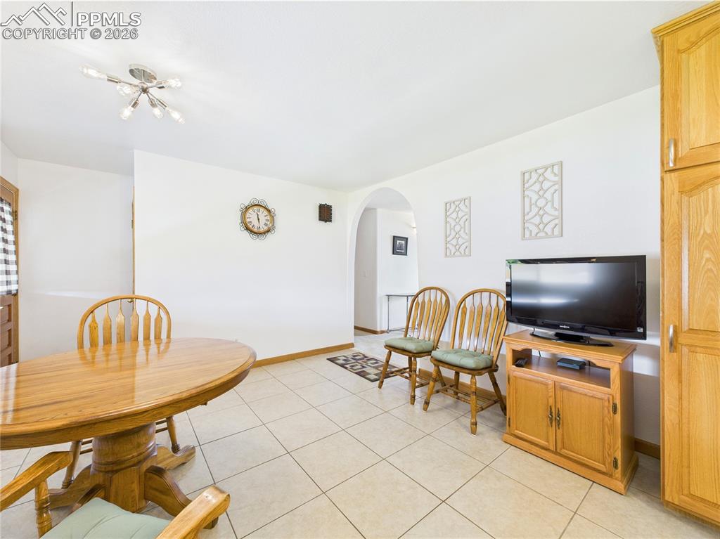 32006 Ford Road Pueblo, CO 81006 - Photo 17 of 50 a view of workspace and livingroom with furniture