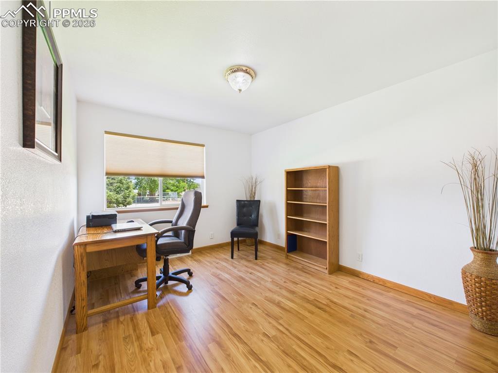32006 Ford Road Pueblo, CO 81006 - Photo 25 of 50 a view of a workspace with furniture and a window