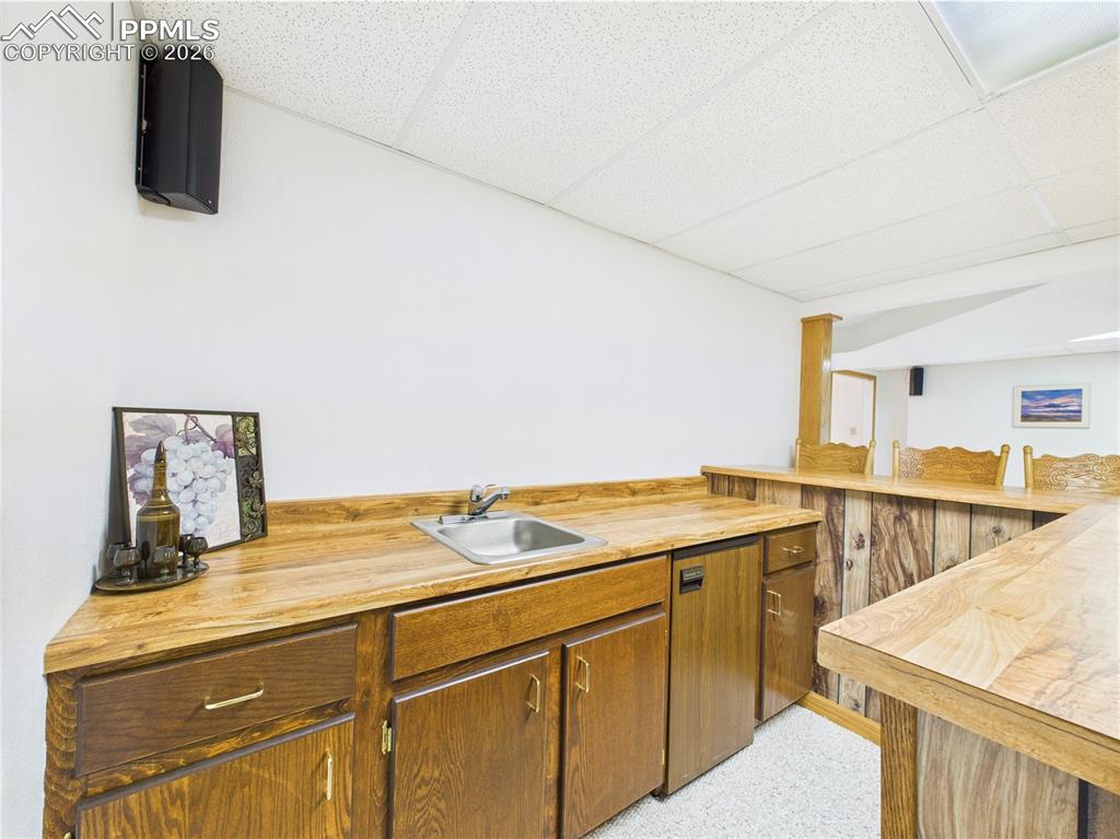 32006 Ford Road Pueblo, CO 81006 - Photo 35 of 50 a room with a sink and a stove