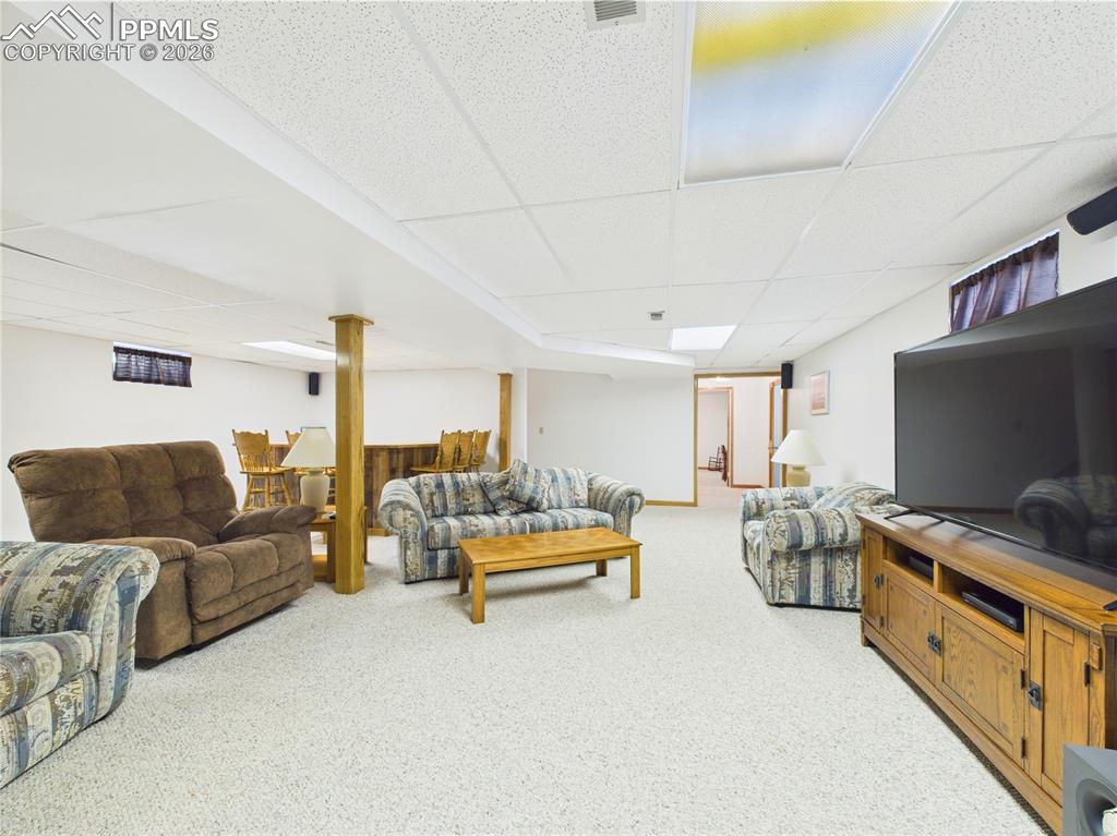 32006 Ford Road Pueblo, CO 81006 - Photo 39 of 50 a bedroom with furniture and a flat screen tv