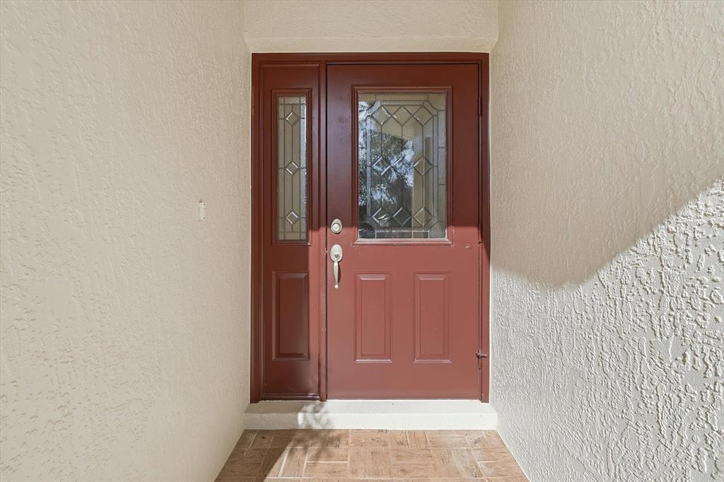6301 West Glynborne Loop Crystal River, FL 34429 - Photo 11 of 63 a view of a front door of a house