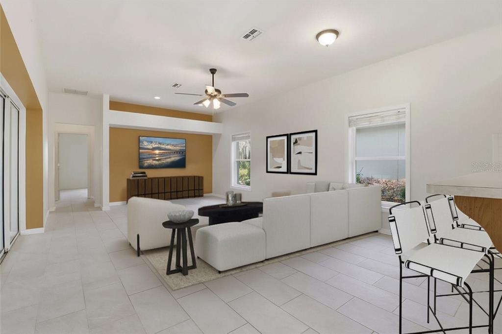 6301 West Glynborne Loop Crystal River, FL 34429 - Photo 2 of 63 a living room with furniture and a window