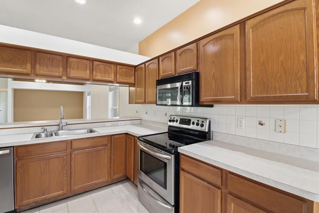 6301 West Glynborne Loop Crystal River, FL 34429 - Photo 26 of 63 a kitchen with a sink and cabinets