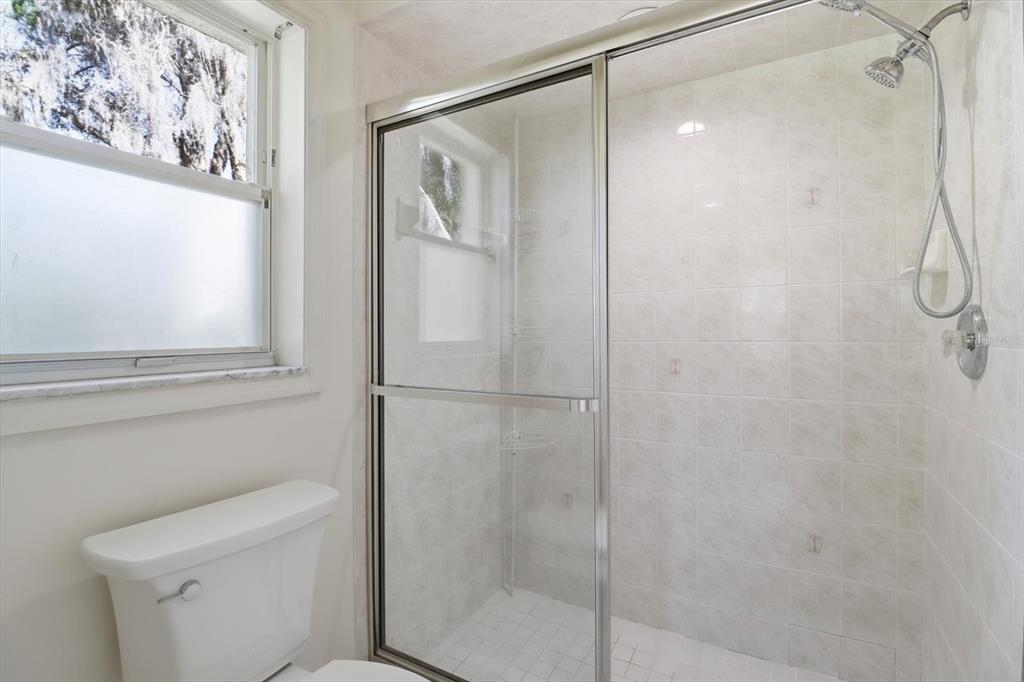6301 West Glynborne Loop Crystal River, FL 34429 - Photo 35 of 63 a bathroom with a shower and toilet
