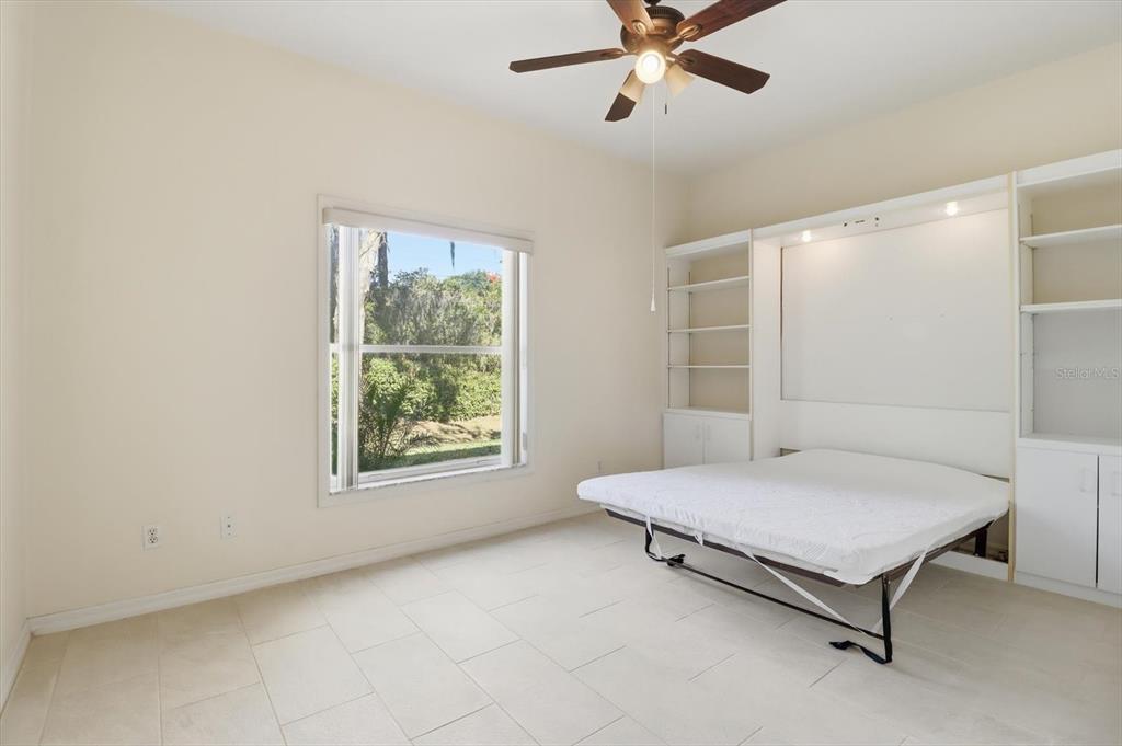 6301 West Glynborne Loop Crystal River, FL 34429 - Photo 36 of 63 a bedroom with a bed and window